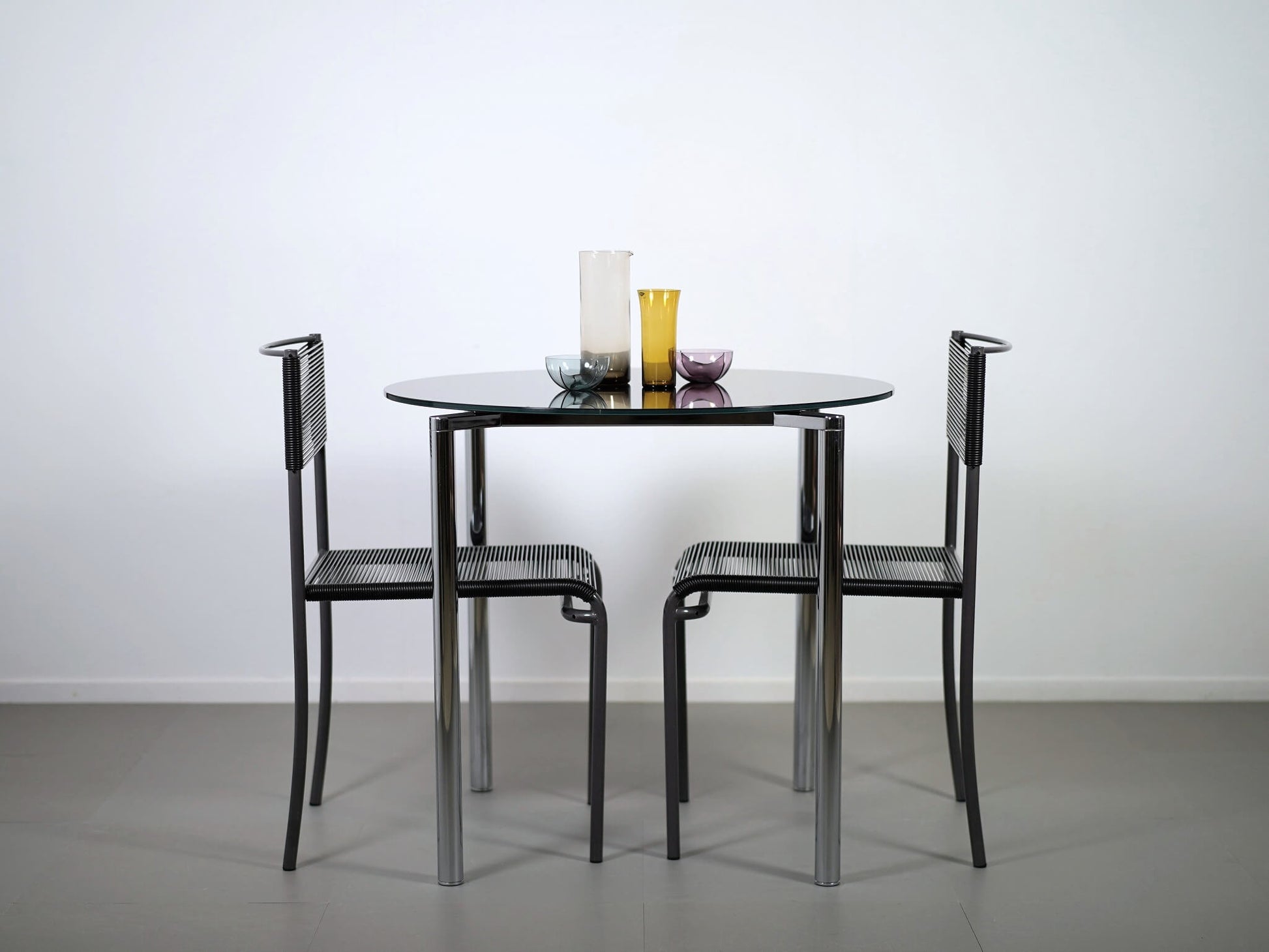 ペリカンデザインによるフリッツハンセンのプラーノテーブル・黒ガラス