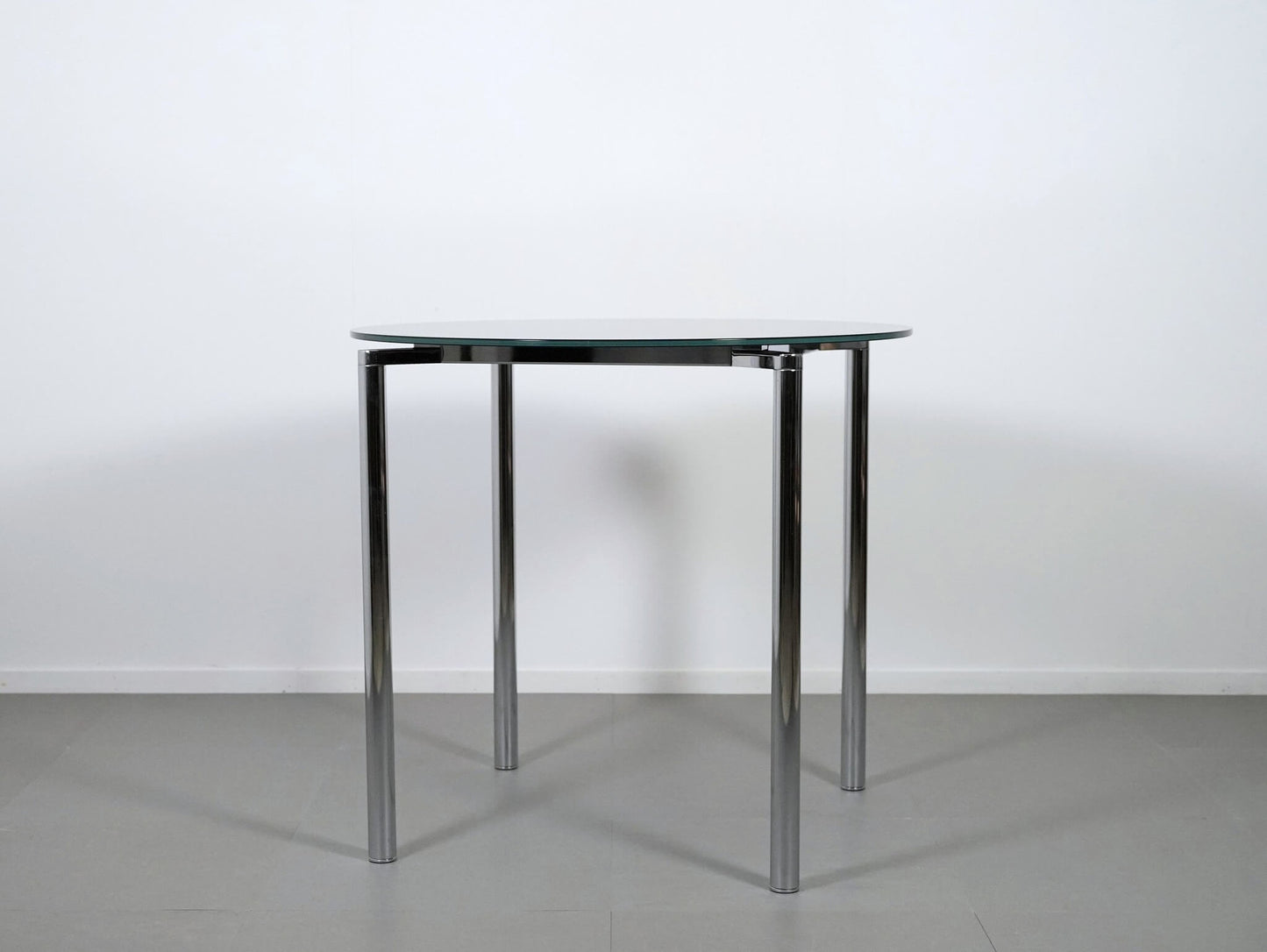 ペリカンデザインによるフリッツハンセンのプラーノテーブル・黒ガラス