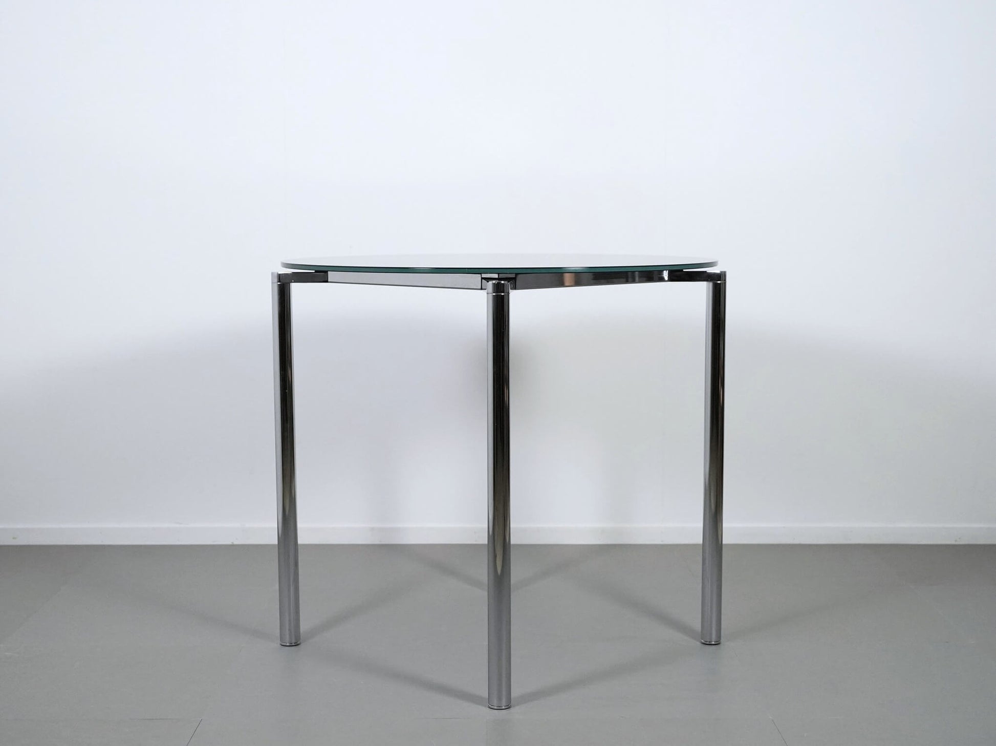 ペリカンデザインによるフリッツハンセンのプラーノテーブル・黒ガラス